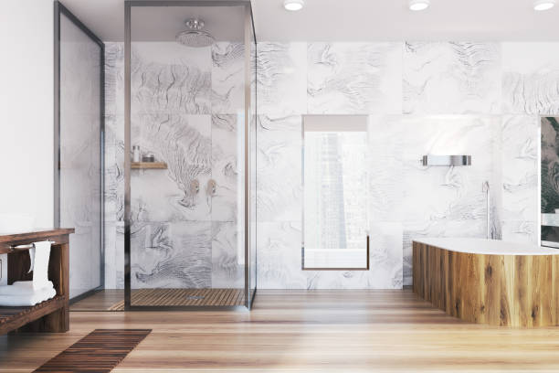 istock Modern bathroom with a wooden tub 933115542