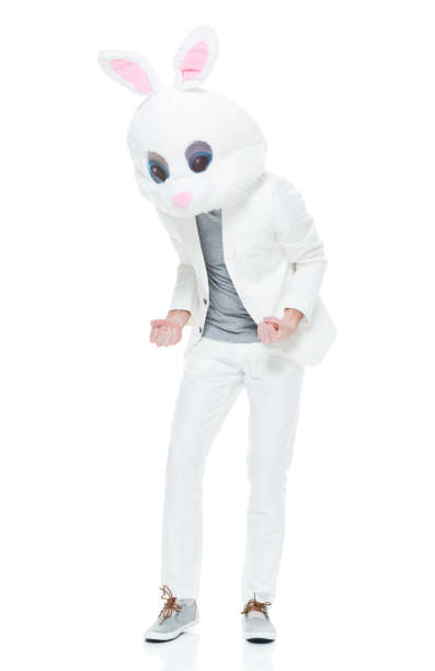 istock Well dressed man with bunny costume fist pump 933115752