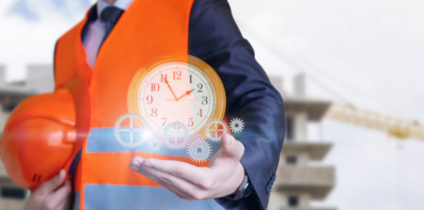 Civil engineer displays the clock with gears.