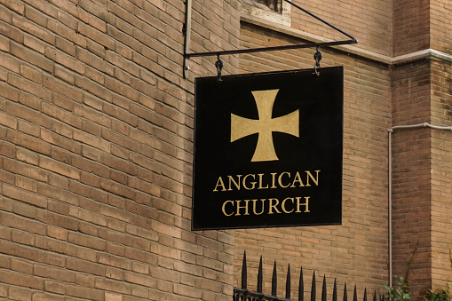 Anglican church sign on the street.