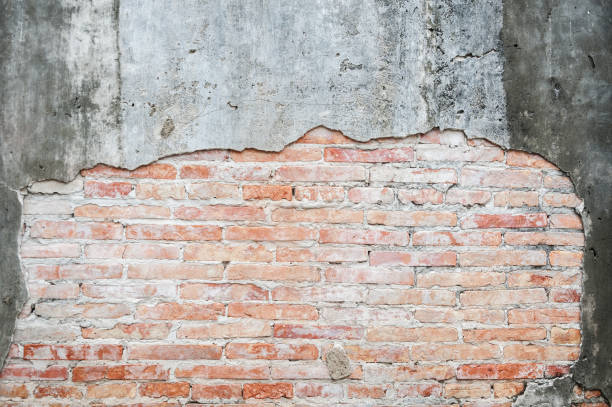 istock Old cracked concrete vintage brick wall background, Textured background, old brick wall pattern 933118856