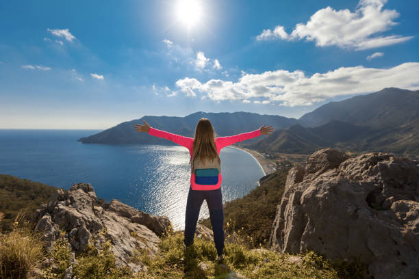 istock Young woman on mountain top 933118876
