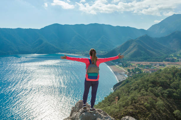 istock Young woman on mountain top 933119242