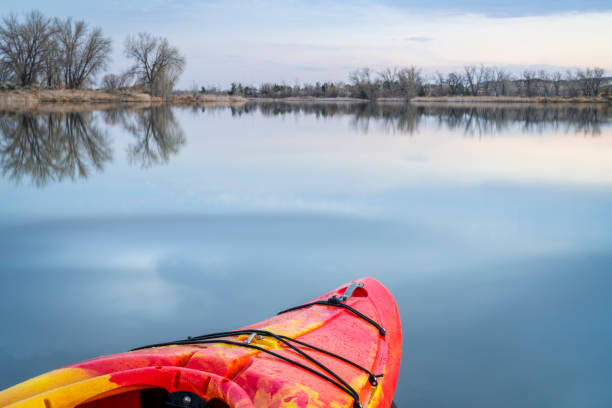istock bow of whitewater kayak on lake 933130674
