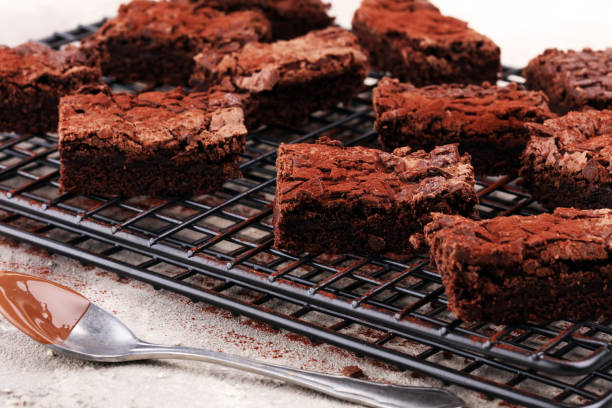 istock homemade chocolate brownies on rustic table. brownie bakery. 933136444