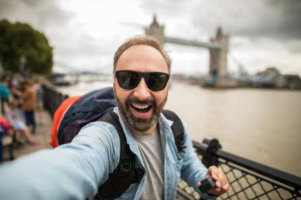 istock Mature man in  London taking a selfie 933136674