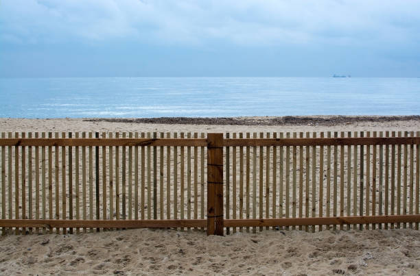 istock Tranquility on Mediterranean fenced winter beach 933138000