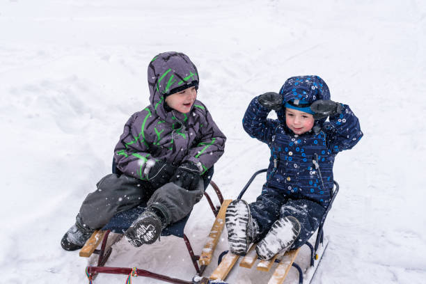istock Happy friends having fun with snow 933140866