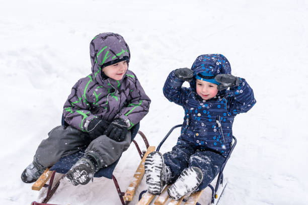 istock Happy friends having fun with snow 933140946