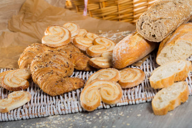 istock Various kinds of bread and  bakery products on table 933153558