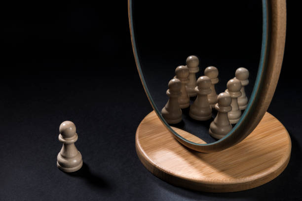 istock The chess pieces in front of the mirror. 933163858