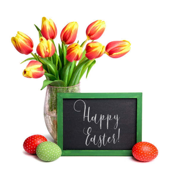 istock Bunch of red tulips with yellow tops, chalk board and colored Easter eggs on white, text 933166412