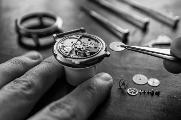istock Process of installing a part on a mechanical watch, watch repair 933169110