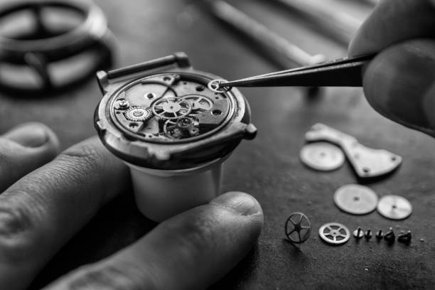 istock Watchmaker is repairing the mechanical watches in his workshop 933169144