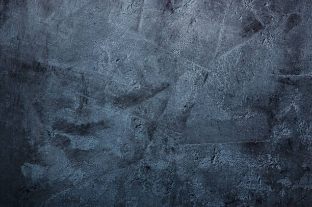 istock Texture of a dark blue concrete wall for background 933178710