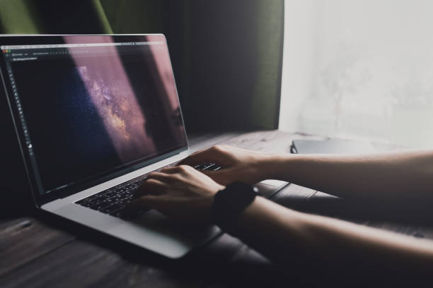 istock Man freelancer is working using laptop computer at home office. Freelance lifestyle workplace 933184072