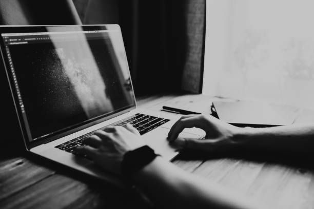 istock Man freelancer is working using laptop computer at home office. Freelance lifestyle workplace 933184162