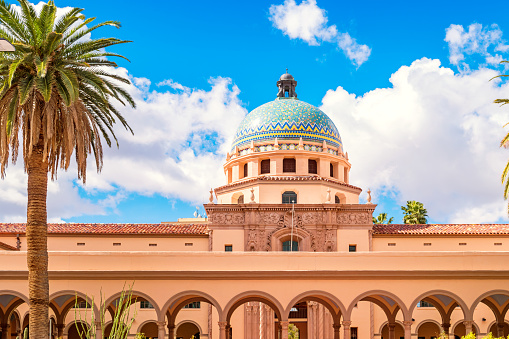 Stock photograph of the landmark Old Pima County Courthouse in downtown Tucson Arizona on a sunny day.