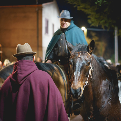 Rasiglia (Foligno), Italy - January, 2018. Wayfarers riding horses in a living Christmas Nativity scene reenactment. Square format.