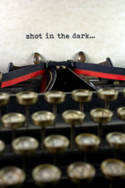 istock Antique typewriter with saying shot in the dark 933212572