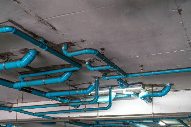 istock Soil Waste PVC pipe sanitation work in construction site building 933271076