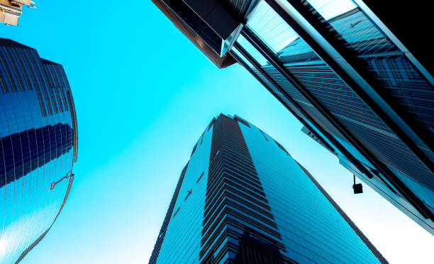 istock Bottom up view of Modern office building in Hong Kong 933294838