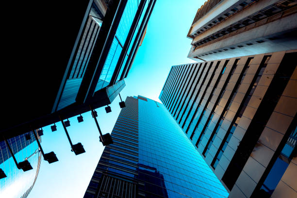 istock Bottom up view of Modern office building in Hong Kong 933294844