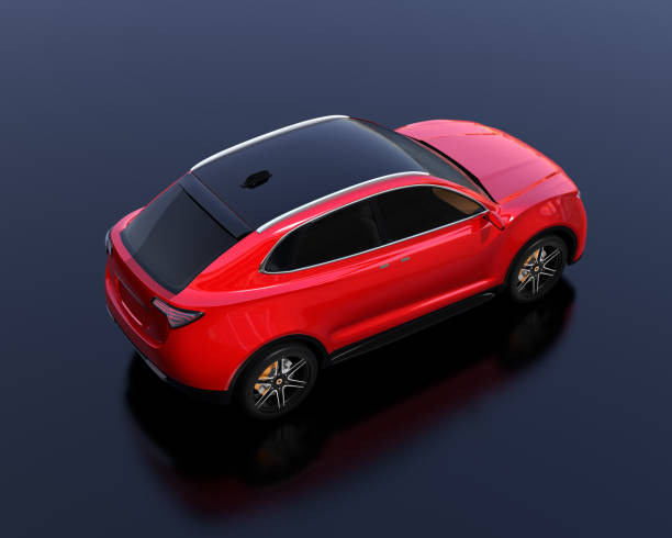 Metallic red Electric SUV concept car parking on reflective ground