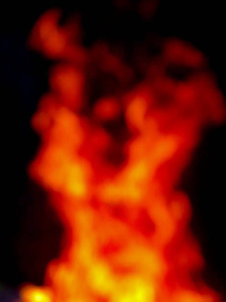 istock Orange Yellow Burning Fire Flames Copy Space Black Background 933307358