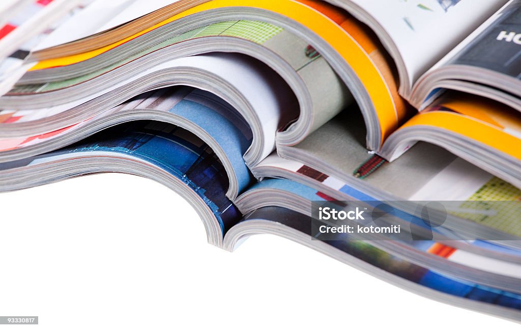 Pile of different types of magazine in white background Pile of colour illustrated magazines on white background. Isolated. Color Image Stock Photo