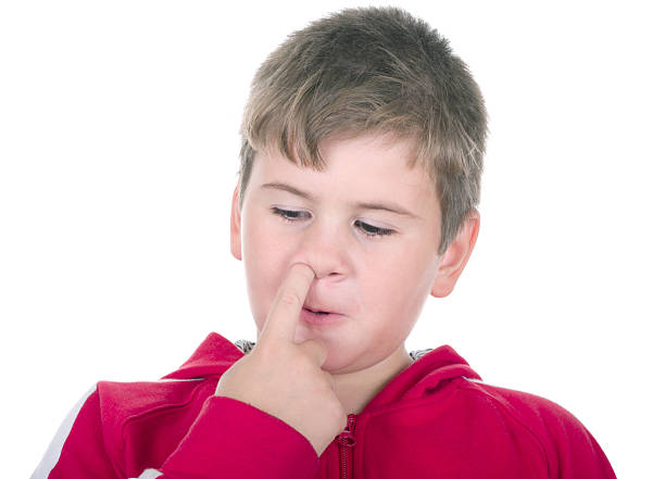 istock Little boy picks in a nose 93330876