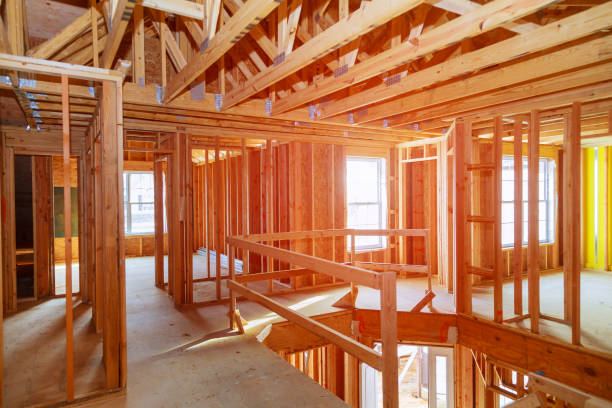 istock New home construction with wooden house frame 933309980