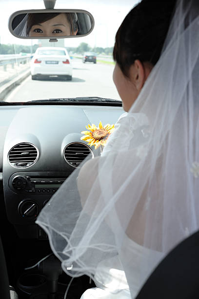 istock Bride drives sport car 93331227