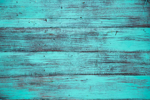 istock Blue color, grunge old scratched wood board textured background 933315128