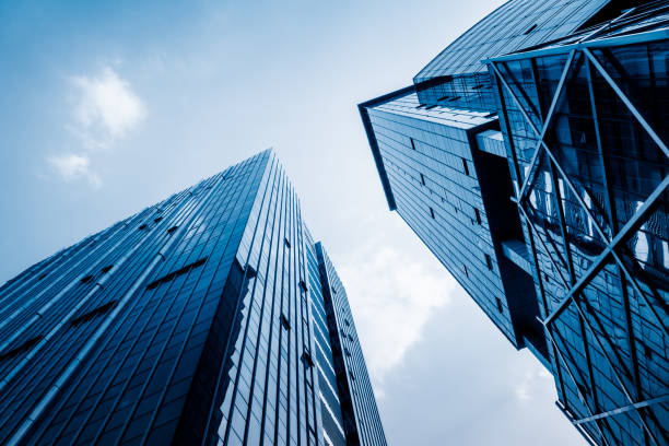 istock High modern skyscrapers over blue sky 933318020