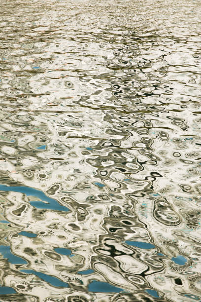 istock Building reflecting in water - Abstract shapes 933318444