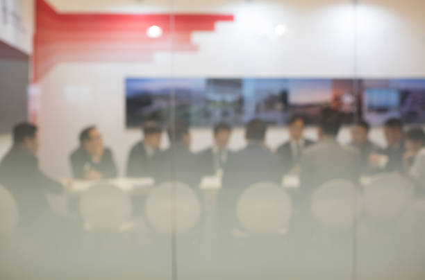 istock People in a Business Meeting. Bokeh Blur. 933320618