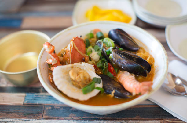 istock Seafood Soup in a Bowl. Shellfish, Shrimp, Green Onions. 933320816
