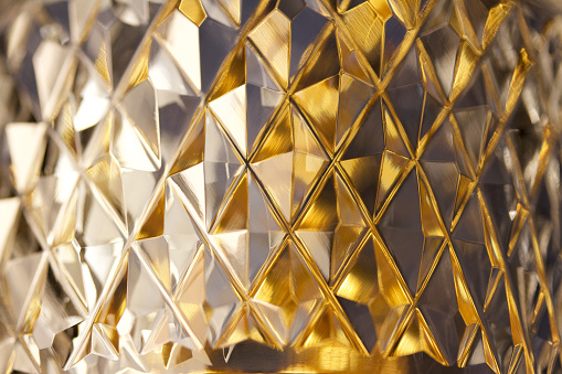 This close-up image features hand cut diamond shape facets on beautiful lead crystal glassware