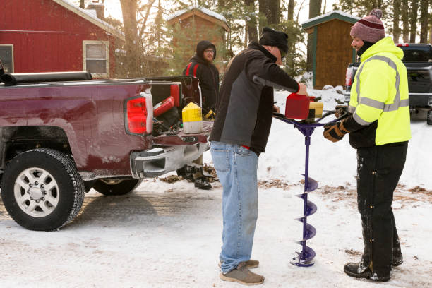 istock Fueling ice fishing auger 933326104