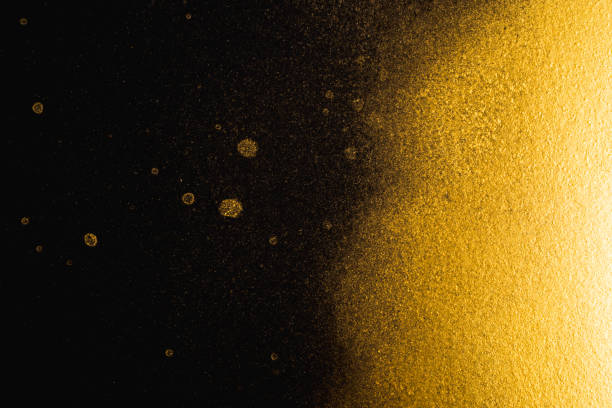 istock Golden abstract grainy texture on black background 933326366