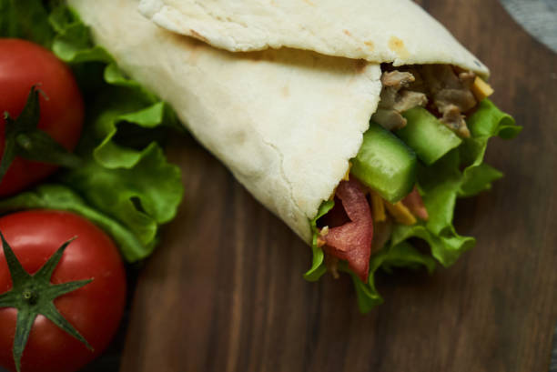 istock Shaurma sandwich chicken roll in a pita 933328972