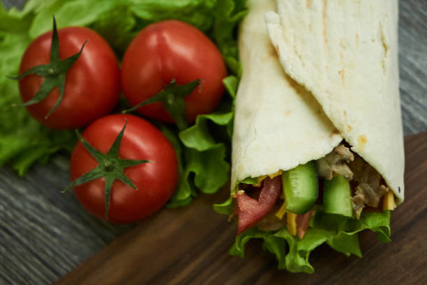 istock Shaurma sandwich chicken roll in a pita 933329232