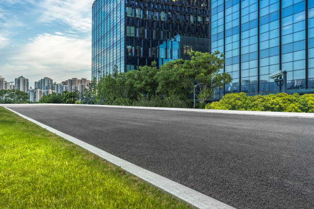 istock Empty road front of modern buildings 933338838