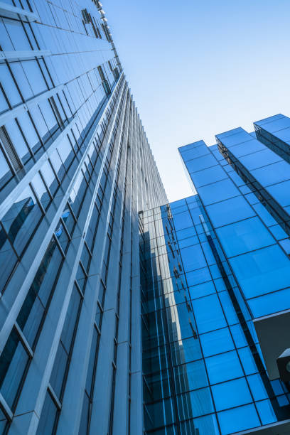 istock High modern skyscrapers over blue sky 933341880