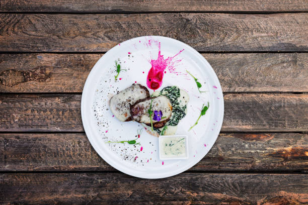 istock Medallions of veal with cheese and spinach. 933341926