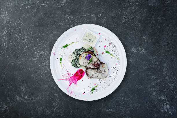istock Medallions of veal with cheese and spinach. 933341944