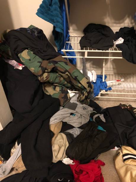 istock Messy room clothing everywhere 933347728