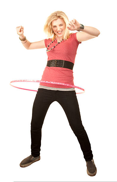 istock Girl twirling a toy hoop 93335178