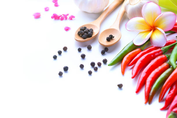 Asian ingredients food fresh spices Vegetable (tomato, chilli, garlic, pepper, plumeria) with space for text.
